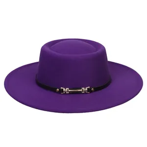 Close-up of purple wool felt flat top hat featuring a black leather band and gold metal buckle