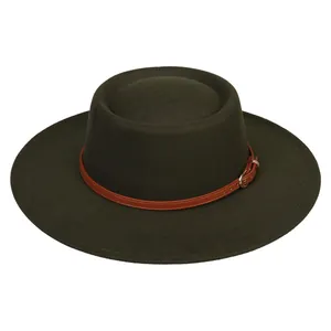 Detail of wool fedora hat with olive green felt texture and brown leather strap buckle