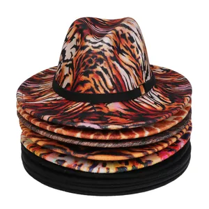 Stack of felt fedora hats with orange tiger pattern and black band with gold buckle