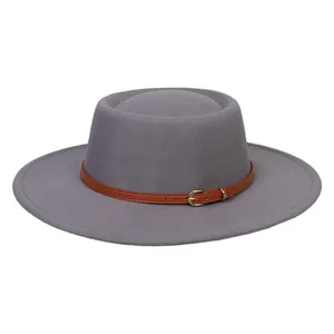 Grey wool felt pork pie hat with brown leather belt and gold buckle on white background