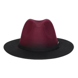 Detail view of burgundy felt fedora hat featuring a black wide brim and metallic buckle