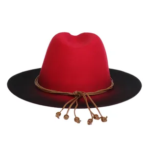 Detail of red and black gradient wool fedora hat with brown rope and wooden beads