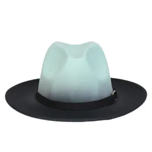 Detail of mint green to black gradient felt fedora hat with black leather decorative band