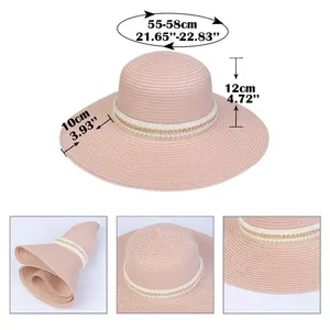 Detailed view showing pink straw sun hat dimensions and foldable flexible material
