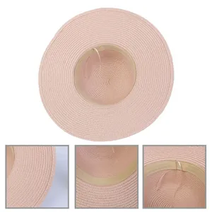 Pink wide-brim straw sun hat for women with fine woven texture and adjustable inner strap