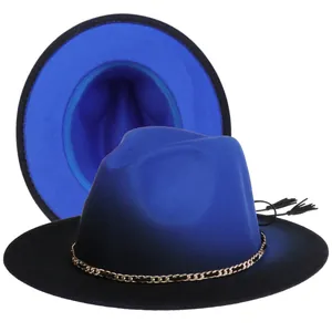 Detail of blue and black fedora hat with gold chain decoration and stylish black tassel