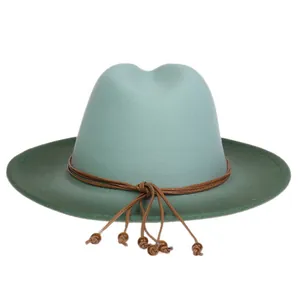 Detail of gradient felt fedora with a leather band and decorative wooden beads