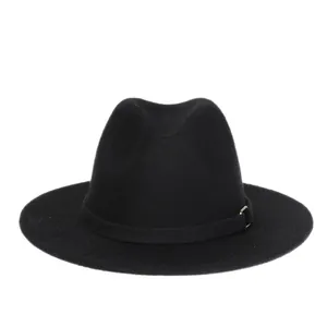 Detail of classic black wool fedora hat featuring a stylish metal buckle and flat brim