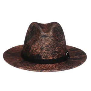 Detail of colorful tie-dye leopard print fedora hat with black band and gold buckle