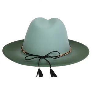 Detail of two-tone wool fedora featuring mint crown, dark green brim and metal chain
