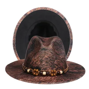 Detail of wool fedora showing brown animal print texture and beaded band decoration