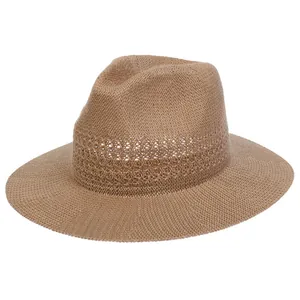 Close-up of brown woven straw hat showing detailed breathable hollow-out design