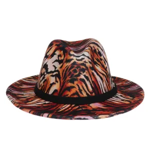 Detail of colorful leopard print jazz hat with warm felt texture and black ribbon band