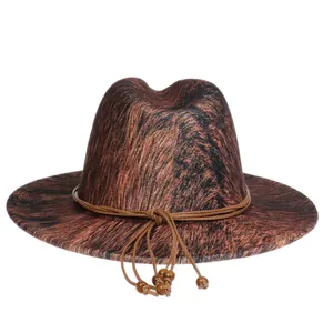 Detail of gradient fedora hat with textured finish and decorative beaded chin strap