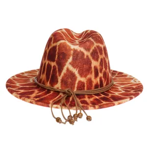 Detail of giraffe print fedora hat featuring a decorative beaded band and wide flat brim