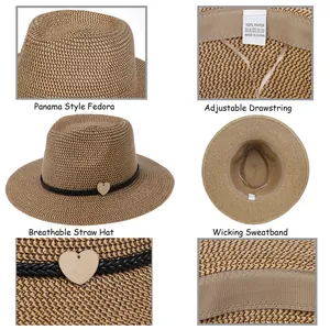 Panama style straw fedora hat with black decorative band and heart charm for sun protection