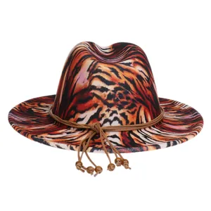 Close-up of animal print fedora hat featuring tiger patterns and beaded leather cord