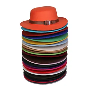 Orange wool felt fedora with brown leather belt and buckle among various colors