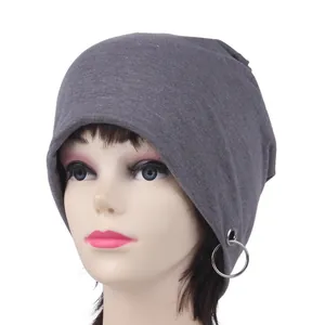 Detail view of grey cotton knit beanie featuring double silver metal rings decoration