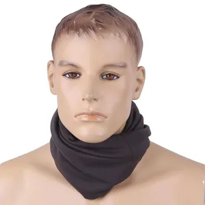 Detail view of seamless dark brown magic scarf showing soft fabric texture on model