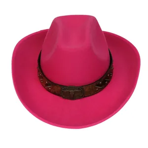 Detail of hot pink felt cowboy hat with leather band and vintage bull head metal buckle