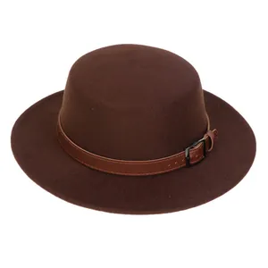 Detail view of the chocolate brown wool felt hat featuring a leather band and metal buckle