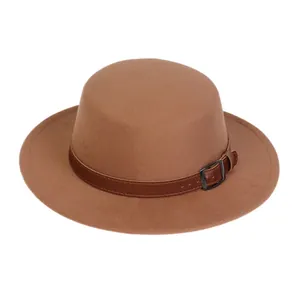 Detailed close-up of brown wool felt fedora featuring a leather band and metal buckle