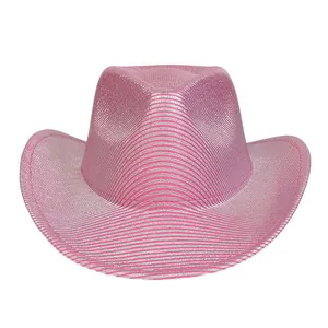 Detailed macro view of pink sparkling cowboy hat with silver trim and metallic texture
