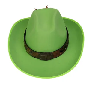 Detail of green wool cowboy hat with vintage bull skull buckle and leather band