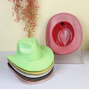 Close-up of colorful sequin cowboy hats in a stack featuring metallic shine for party wear