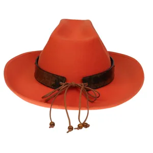 Detail of orange wool cowboy hat featuring a vintage brown band with beaded cross laces