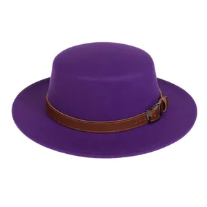 Detail of purple wool felt boater hat with a brown leather strap and metal buckle