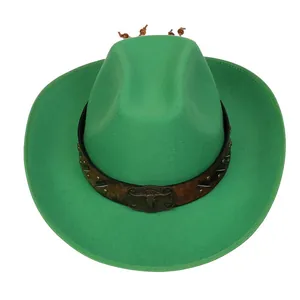 Detail view of a green wool cowboy hat featuring a bronze bull head buckle and wood beads