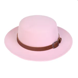 Detailed view of pink wool fedora hat with brown leather belt and metallic buckle
