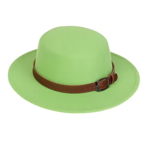 Detail view of fruit green wool felt flat top hat with brown leather buckle strap