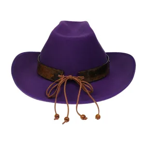 Detail of purple felt cowboy hat featuring vintage brown band with wooden bead accents