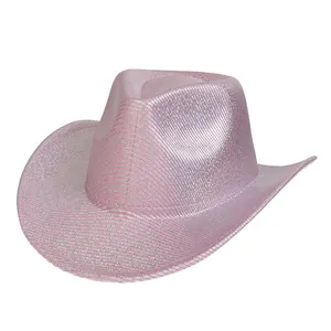 Close-up of pink western cowboy hat with silver trim and metallic glitter woven texture