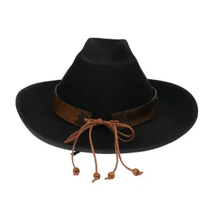 Detail of black wool cowboy hat with vintage brown leather band and wooden bead accents
