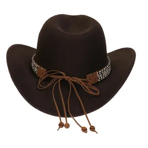Detail of dark brown cowboy hat with ethnic woven band and decorative wooden beads