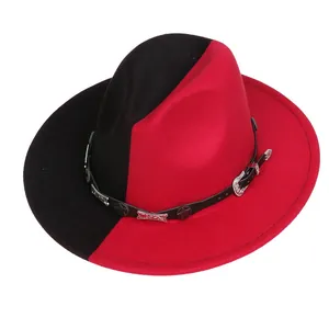 Vue détaillée du chapeau bicolore rouge et noir avec ornements gothiques en métal argenté