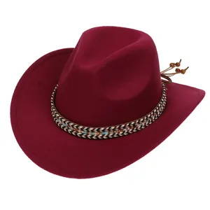 Detail of burgundy fedora hat with ethnic woven band and side leather bead accents
