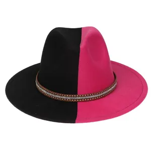 Detail of two-tone black and pink wool felt hat with studded rhinestone leather band
