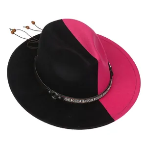 Détail d'un chapeau fedora bicolore noir et rose avec ruban ethnique et perles