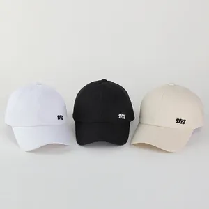 Three cotton sun hats in white, black and beige featuring DYJ side embroidery