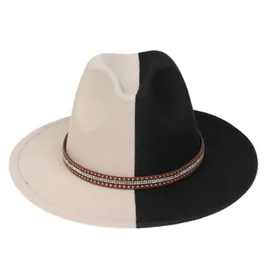Detail of two-tone wool fedora with gold-studded brown band and shimmering rhinestones