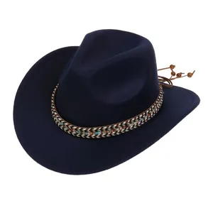 Deep blue felt cowboy hat detail with ethnic woven band and turquoise beads decoration