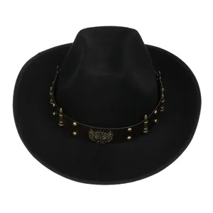 Close-up of black felt cowboy hat with bronze rivets, bullets, and eagle crest detail