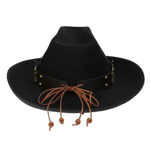 Detail of western cowboy hat with studded leather band and wooden bead tassels