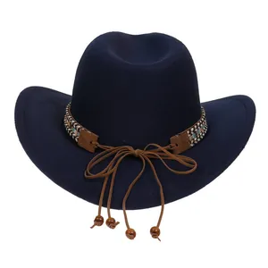 Detail of dark blue cowboy hat featuring a colorful woven band and wooden beads