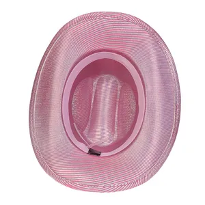Macro view of metallic pink cowboy hat showing woven texture, sweatband and inner drawstring